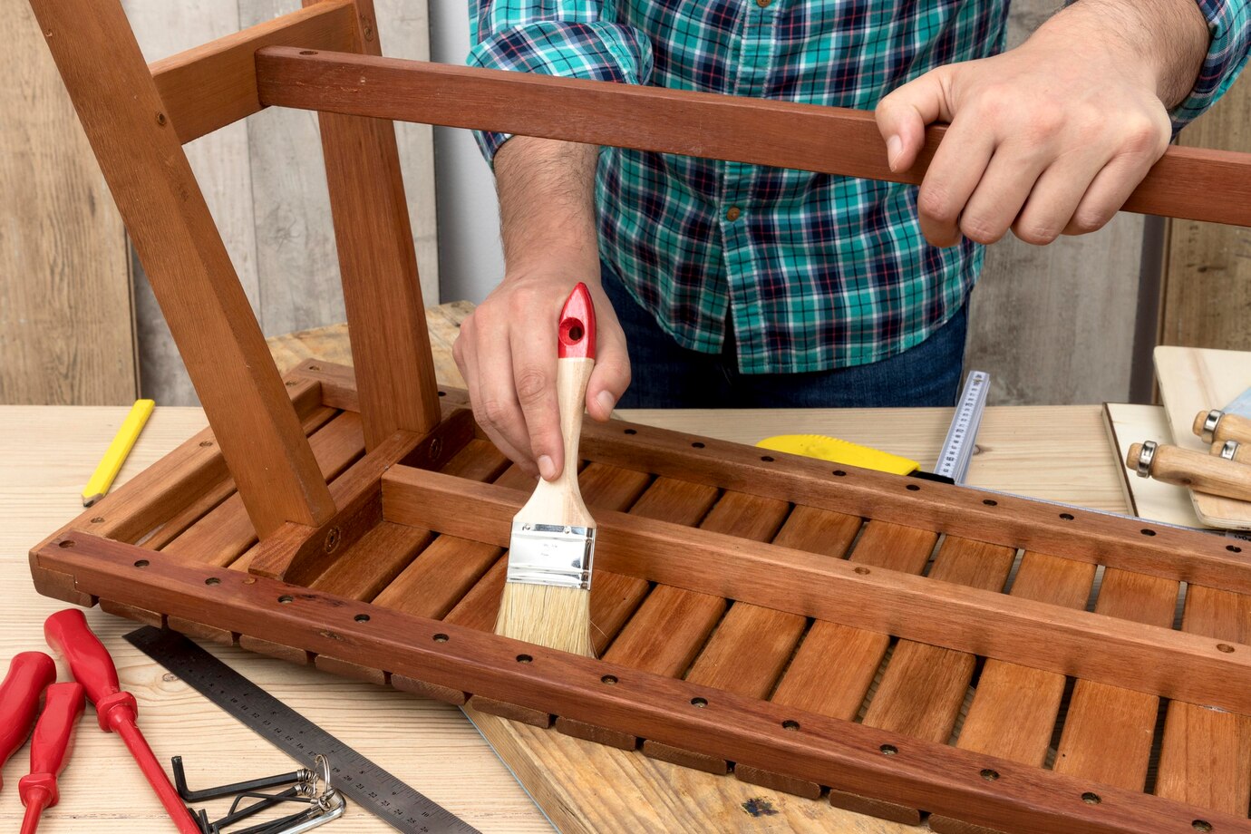 carpenter worker using his tools on wood