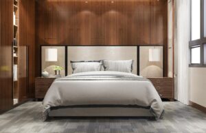 Modern bedroom featuring a gray bed with striped bedding