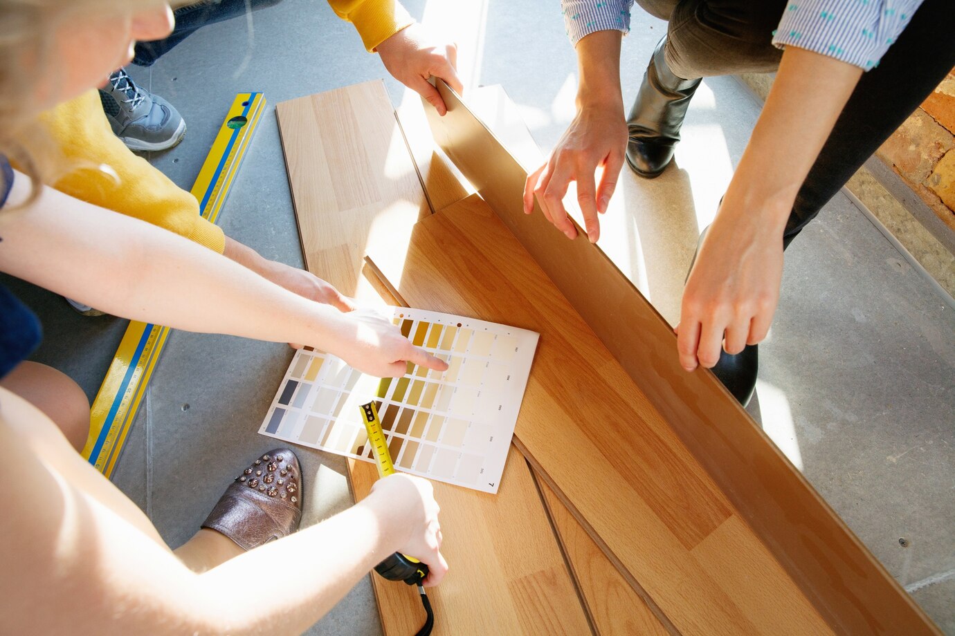 people selecting flooring and paint colors
